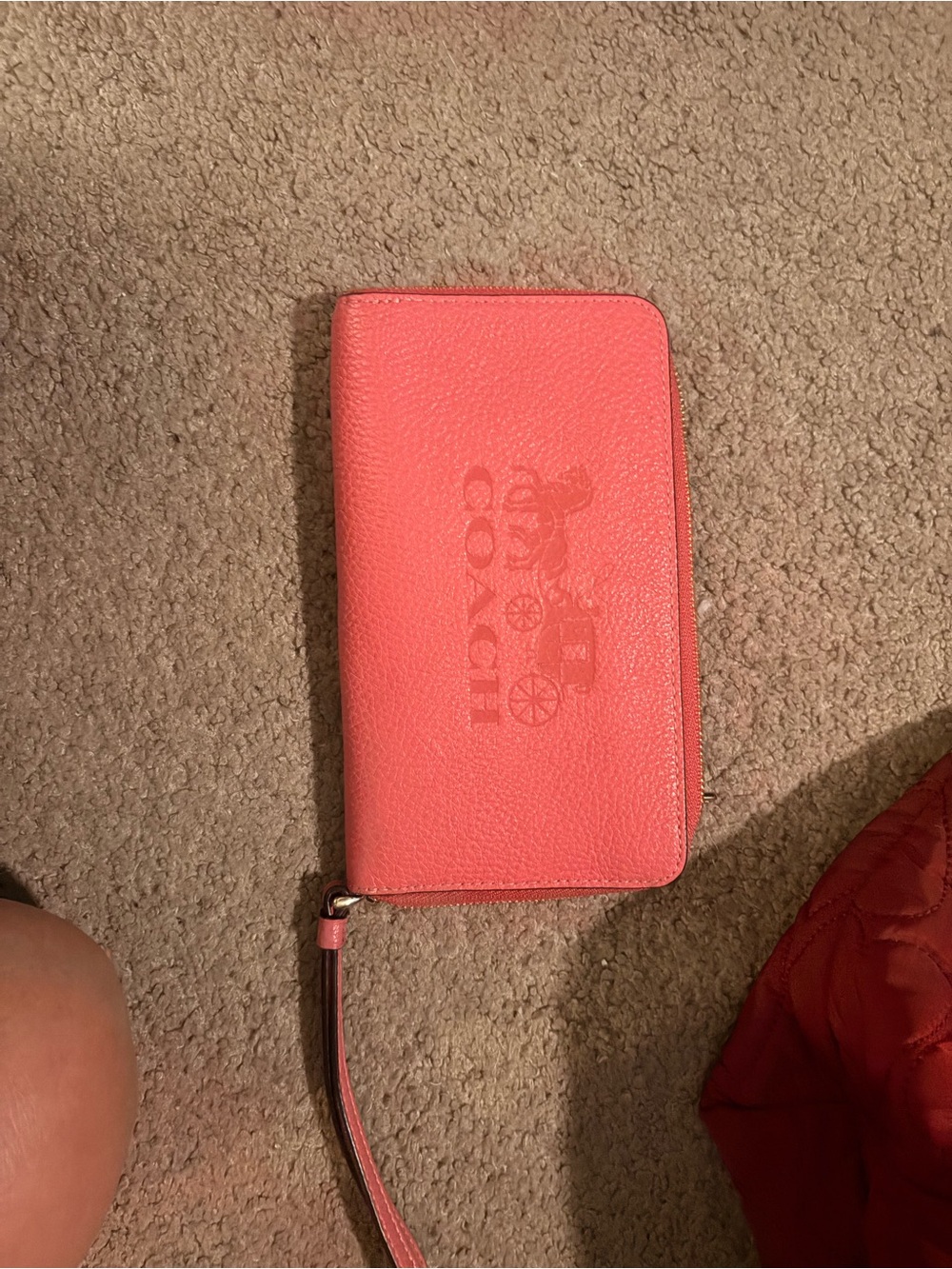 Coach Pink Leather Wristlet Phone Case with Embossed Logo